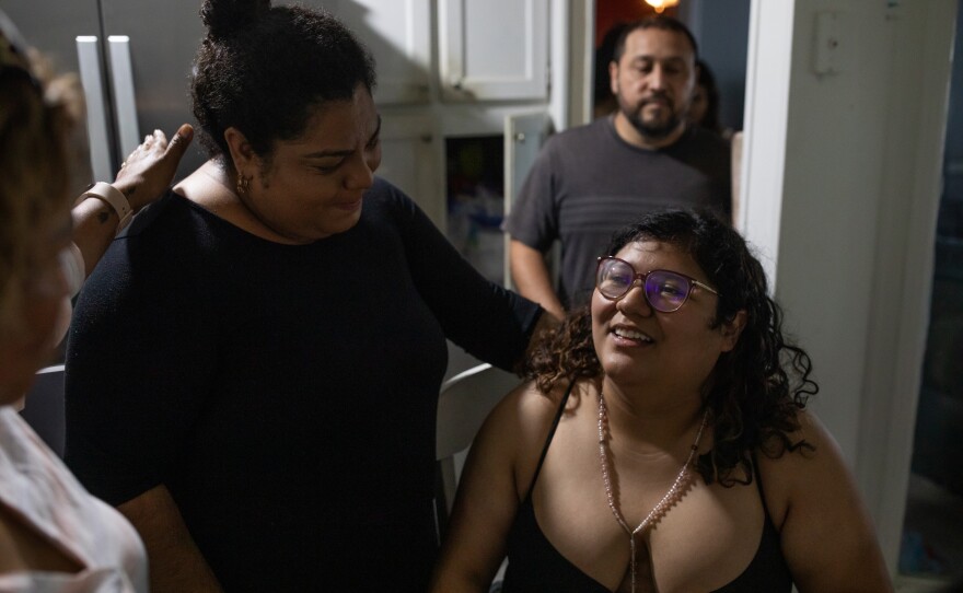 Family members including her aunt Marlen Gonzalez, left, talk with Genesis Espinoza Sierra, right, at her family's home in Wallace on April 17, 2026. Her brother Edilberto Espinoza Sierra was shot and killed by the Wilmington Police Department in the early morning hours of March 8 following an incident in a downtown Wilmington parking garage. Espinoza Sierra was incorrectly identified as a suspect before he was killed and now his family is seeking answer and accountability.