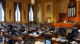 State representatives gather on the floor of the Louisiana House of Representatives on the final day of the First Extraordinary Session, Jun. 30, 2020.