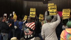 Dozens showed up to protest the ordinance. Social activist Tony Davis says it dehumanizes people experiencing homelessness.