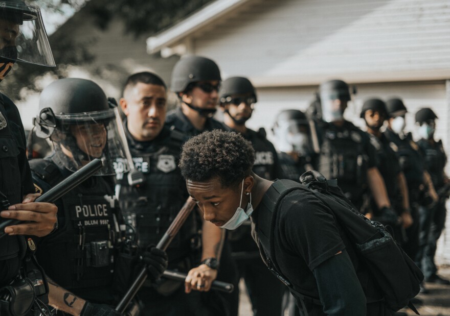 At a Houston protest, a young black man came up to the front lines and asked each officer if they felt any sympathy about what was going on. The responses they gave him were: none.