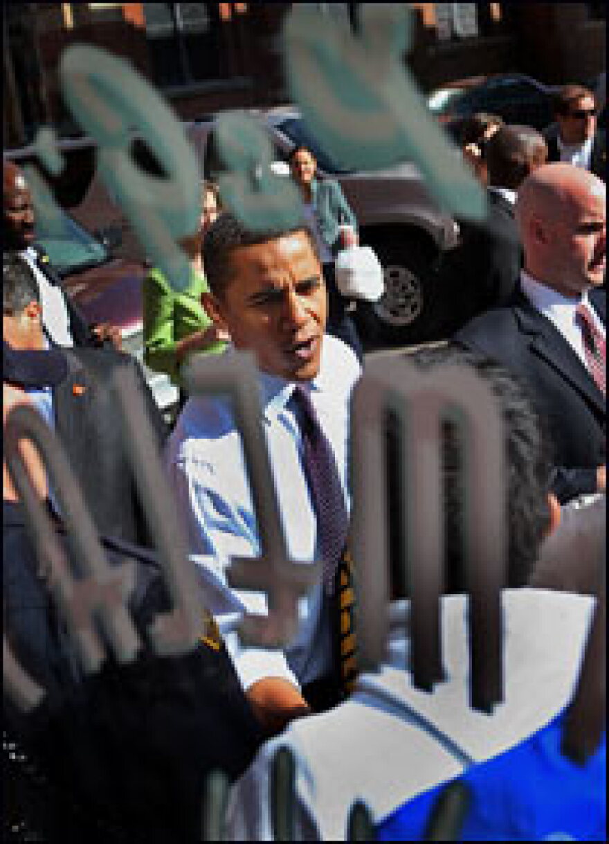 Illinois Sen. Barack Obama greets people outside after of Pamela's Diner on April 22, 2008, in Pittsburgh, Pennsylvania.