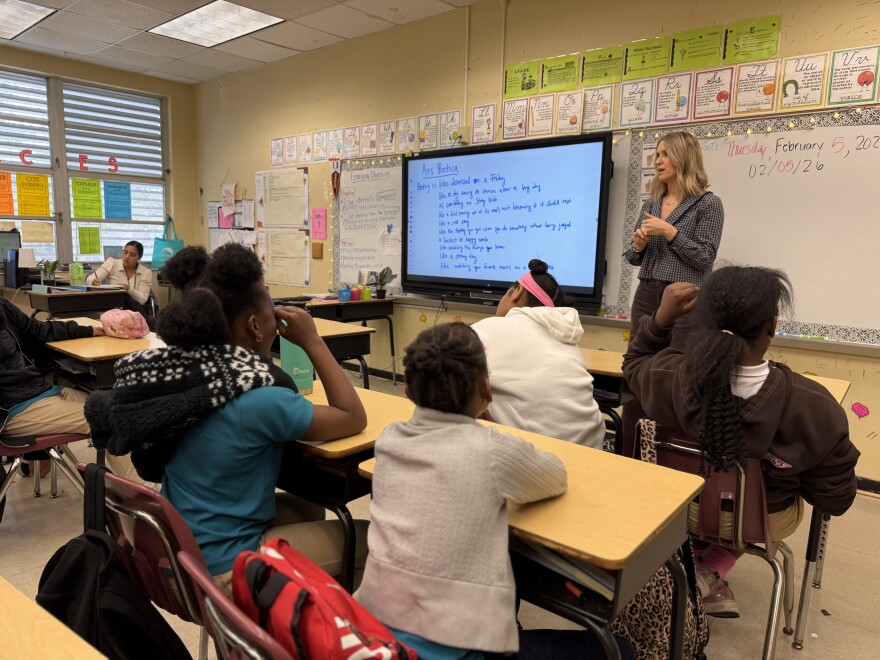At the beginning of class, students participate in collectively writing a warm-up poem ahead of the lesson Cabrera has on ZipOdes.