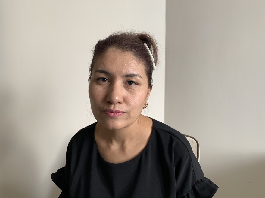 Gulserik Kazykhan is struggling to get more information about her detained brother-in-law from visiting relatives. "If you don't return, the guarantors will suffer."