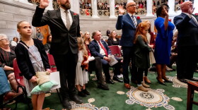 Sen. Nick Shroer, R-O’Fallon, takes the oath of office alongside his daughters on Wednesday, Jan. 4, 2023, during the first day of the legislative session at the Missouri State Capitol in Jefferson City. Senators Travis Fitzwater, R-Calloway County, Karla May, D-St. Louis, and Mike Bernskoetter, R-Jefferson City, are to Shroer's right.