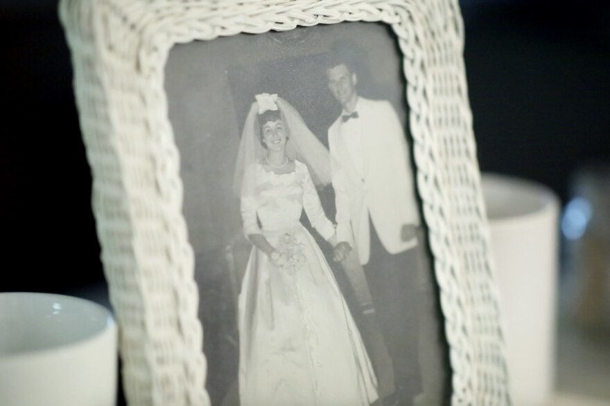 An up-close photo of a framed wedding photo