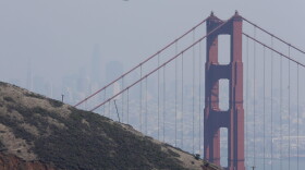 A seaplane flies over the Golden Gate Bridge Friday, Sept. 1, 2017. (AP Photo/Eric Risberg)