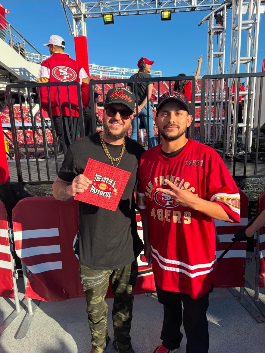 Steven Navarro of Yuma, right, with San Francisco 49ers rapper Travis King, at a game against the Atlanta Falcons at Levi's Stadium in Santa Clara, Calif. on Sunday, Oct. 19, 2025.