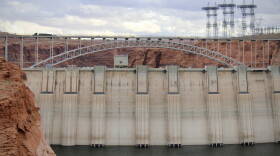 Water levels sit low behind Glen Canyon Dam in Page, Arizona on November 2, 2022. Colorado River experts say long-term changes are needed to keep the region's water use sustainable and avoid catastrophe at major dams and reservoirs.