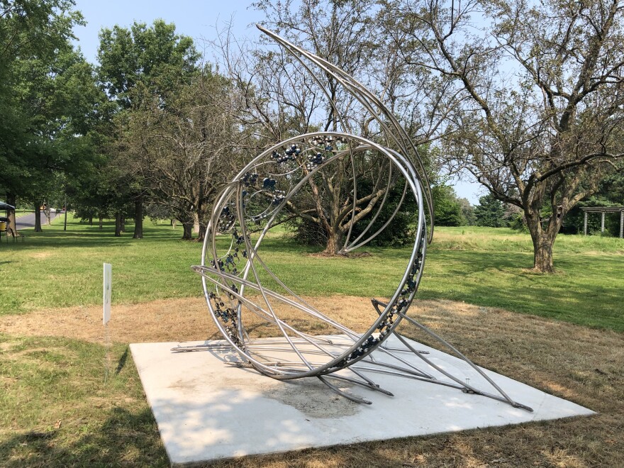 A stainless steel abstract titled "Prometheus 1" by Jaci Willis, is one of four new pieces installed Tuesday in the Donovan Sculpture Garden in Peoria.