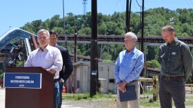 Gov. Josh Stein is joined by Canton Mayor Zeb Smathers, State Department of Environmental Quality Secretary Reid Wilson and Haywood Waterways Executive Director Preston Jacobsen during an event in Canton Thursday, May 14, 2026.