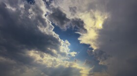Sun rays break through the clouds above Toronto in June 2024. Toronto is one of the Great Lakes cities that does not shut off water for late payment.