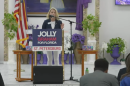 Woman speaking at a podium