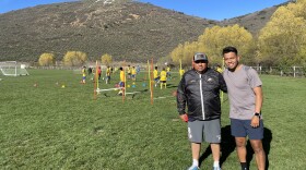 Sebastian Saucedo (right) and his father Martin at the North 40 fields in Park City.