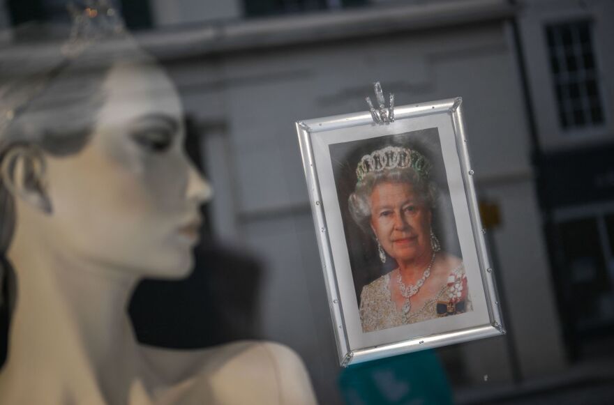 <strong>June 2:</strong> A portrait of Queen Elizabeth II hangs in a shop window in Colchester, England.