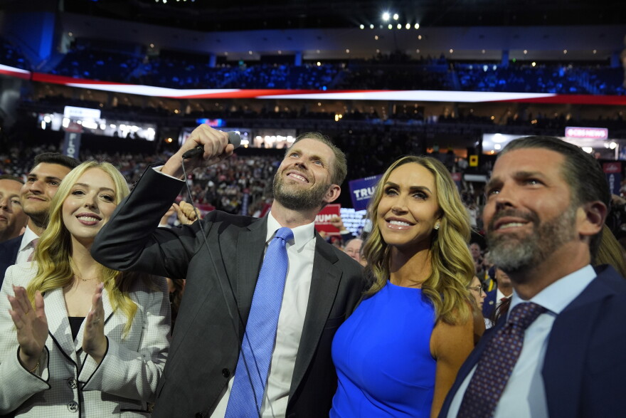 From left, Michael Boulos and his wife Tiffany Trump, Eric Trump and his wife Lara, and Donald Trump Jr., watch the roll call of states during the first day of the Republican National Convention, Monday, July 15, 2024, in Milwaukee.