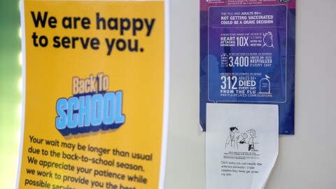 Signs advertising back-to-school vaccinaitons on Wednesday, Aug. 30, 2023, at the John C. Murphy Health Center in Berkeley, Mo. The St. Louis County Health Department is applying to get a special status for this clinic and two others, which would give them additional funding.