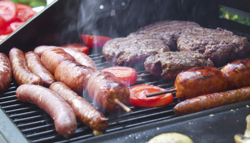Food cooking on grill