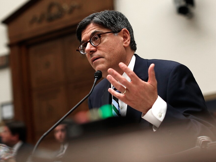 U.S. Treasury Secretary Jacob Lew has announced rules aimed at discouraging U.S. companies from moving their headquarters overseas to cut their tax bills.