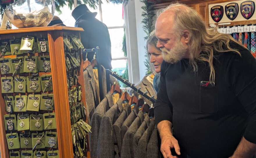 Customers searching through products at Scotland House in Williamsburg.