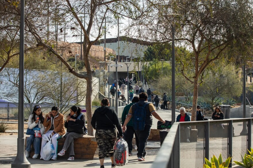 Travelers walk towards the Mexico entrance of the San Ysidro Port of Entry in San Diego on Jan. 20, 2025.