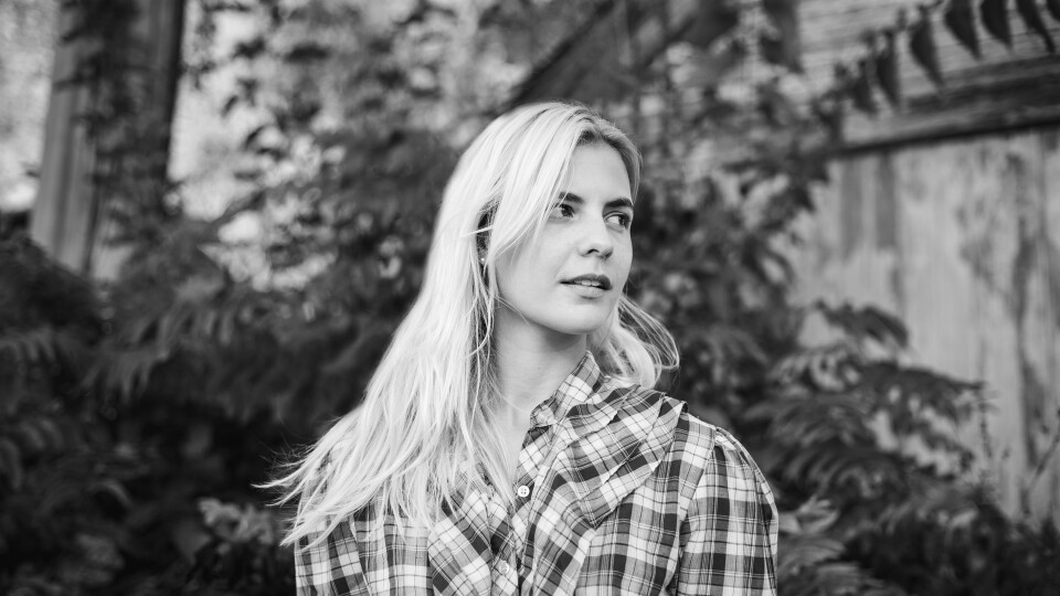 a woman posing for a photograph 