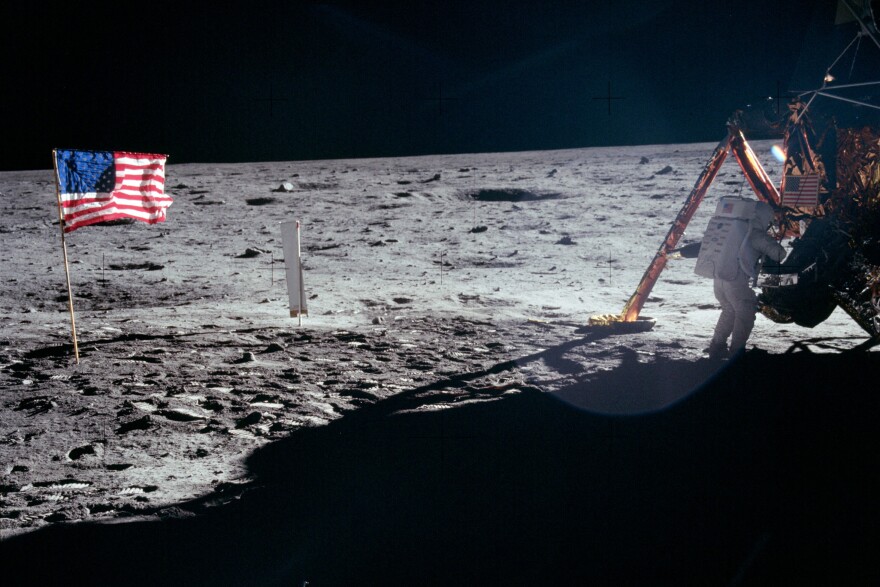Astronaut Neil Armstrong took the majority of the photos while he was on the moon with Edwin "Buzz" Aldrin. As a result, most pictures of an astronaut on the moon during Apollo 11 are of Aldrin. This is one of the rare photos of Armstrong.