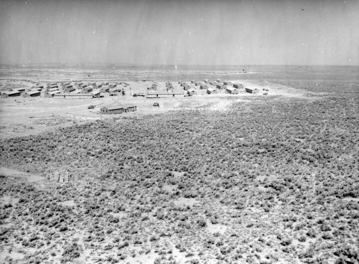 Minidoka under construction. Displays the solitude and expansive vistas of Minidoka.