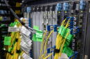 Cables connect to servers at Equinix’s data center in Billerica, Mass.  (Robin Lubbock/WBUR)