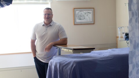 Matt Told poses for a photo in a delivery room at Syringa Hospital in Grangeville, Idaho on Friday, May 29, 2026.