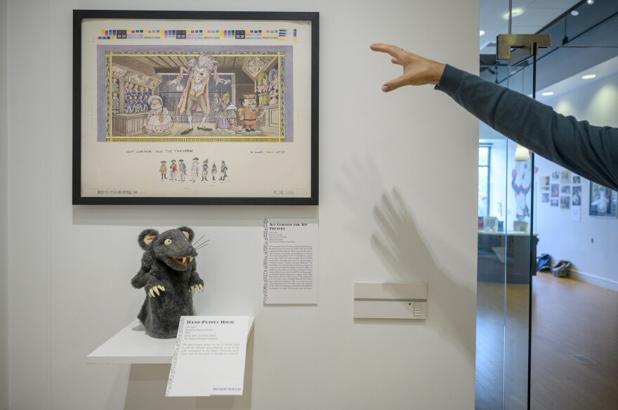 A puppet and drawing of an act-curtain for a production of The Nutcracker are part of the the exhibit "Swing Into Action: Maurice Sendak and the World of Puppetry" now open through December 16, 2022, at the Ballard Institute at UConn Storrs.