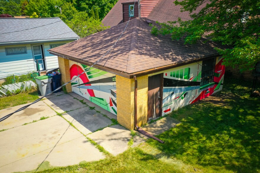 Samer Ghani's garage with the entire finished mural.