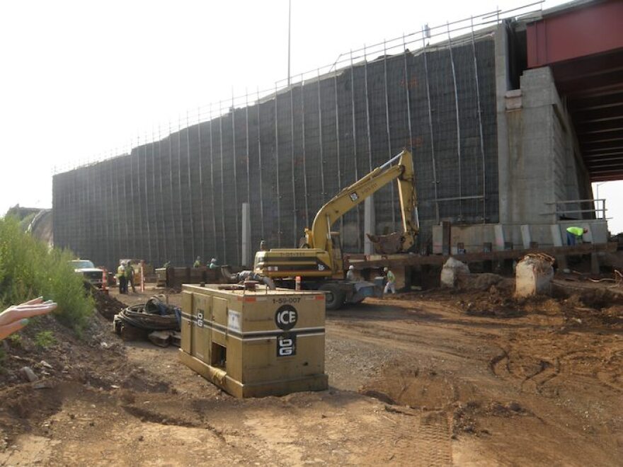 Work at the old Q-Bridge foundation, prior to construction of a retaining wall that would support traffic from I-95 Southbound to I-91 Northbound.