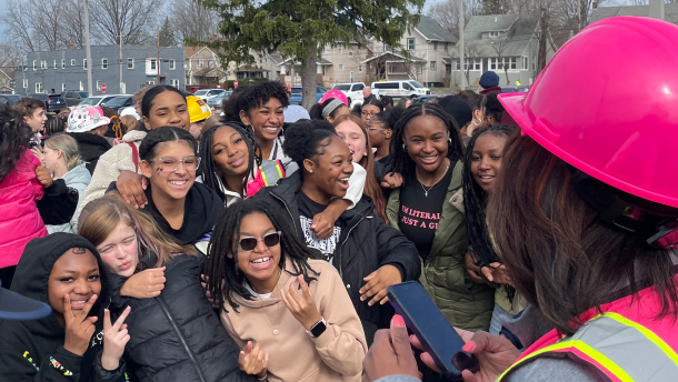 Miller South School for the Performing Arts students pose for Principal Regina Anderson during the groundbreaking ceremony of a new school that will support Miller South and Pfeiffer Elementary. The building will be constructed on the former Kenmore High School site.