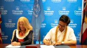 U.N. officials visit the Chaminade campus to sign a partnership agreement for a new Pacific regional training center.
