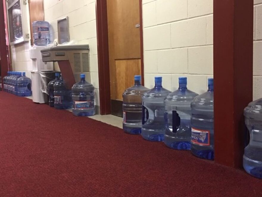 Water approved for drinking in hallway of Ithaca High School.