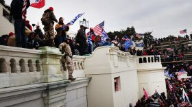 Thousands of Donald Trump supporters storm the United States Capitol building following a "Stop the Steal" rally in Washington, DC.
