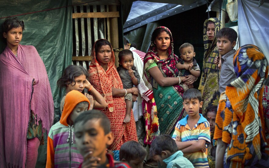 Rohingya Hindu refugees stand outside their makeshift shelters at the Kutupalong refugee camp near Cox's Bazar, Bangladesh, in January. Bangladesh and Myanmar plan to begin the repatriation of hundreds of thousands of Rohingya Muslim refugees who fled from violence in Myanmar.