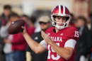 Indiana quarterback Fernando Medoza throws before an NCAA college football game against Wisconsin, Saturday, Nov. 15 2025, in Bloomington, Ind.