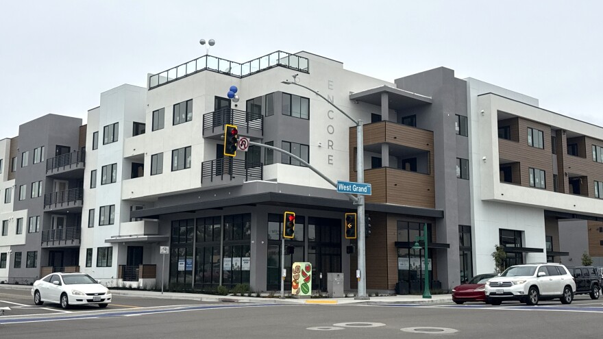 A recently-built mixed-used development on West Grand Avenue. The proposed building height restrictions would target commercial districts along the Grand Avenue corridor.