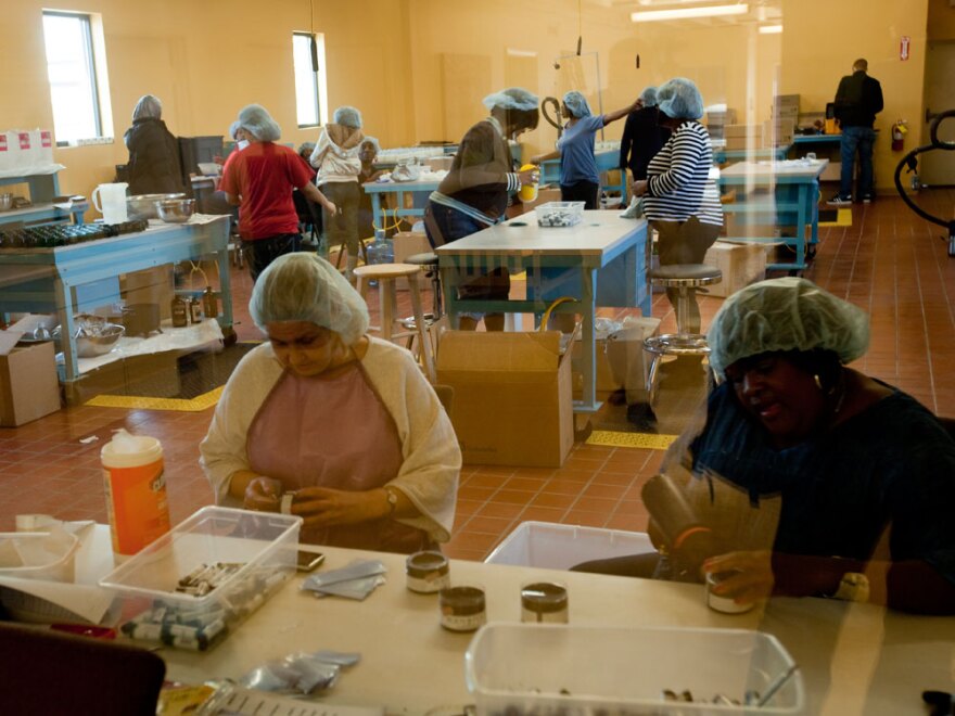 Women at Thistle Farms make body care products by hand and paper from thistles.