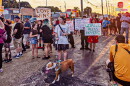 Demonstrators line Summer Avenue on Sunday to protest the El Corralon raid.