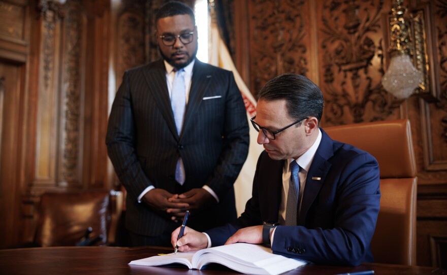 Gov. Josh Shapiro signs his first state budget spending plan into law in Aug. 2023.