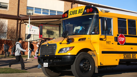 Students get on the bus after class at E.M. Daggett Middle School on Jan. 14 in Fort Worth.