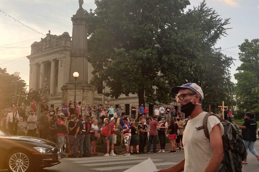The incidents occurred shortly after counter-protesters arrived at the event being held outside the Monroe County Courthouse in downtown Bloomington.
