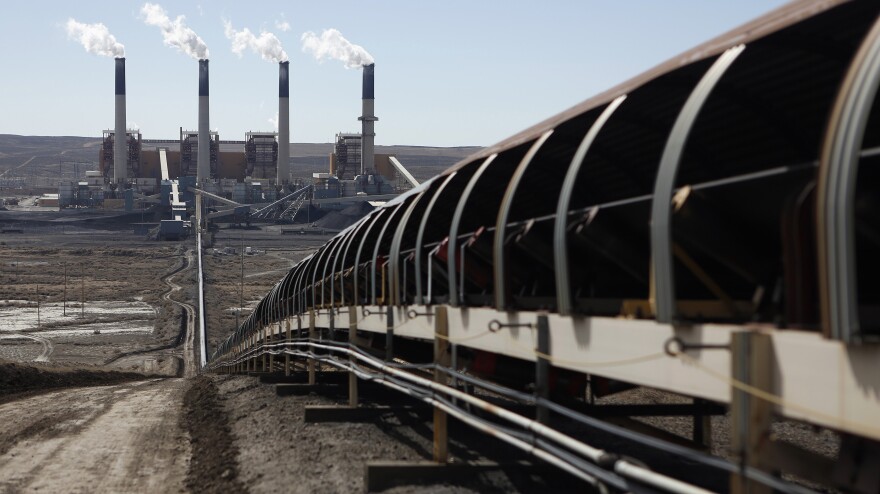 The EPA is proposing rules that would govern carbon dioxide gas emissions by U.S. power plants. Here, coal is transported via conveyor belt to the coal-fired Jim Bridger Power Plant outside Point of the Rocks, Wyo., in March.