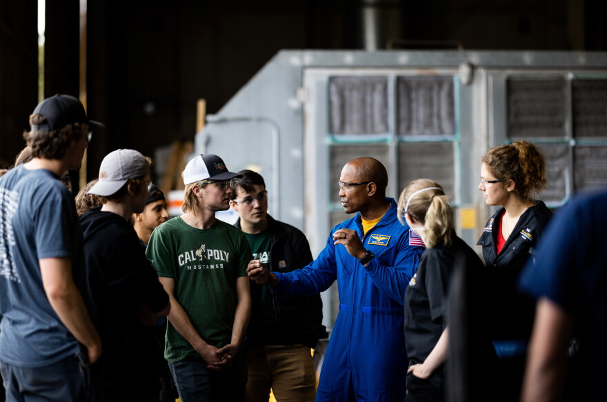 Victor Glover talks with some Cal Poly students.