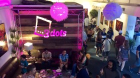 Community members celebrated the opening of 3 Dots Downtown Friday night.