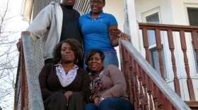 Sharon Jordan (lower left) and her family (clockwise from top left: Rydell, Nikera and Anisha) are working with Bank of America and a Boston nonprofit to repurchase their duplex at its current market price — about half of the original value.