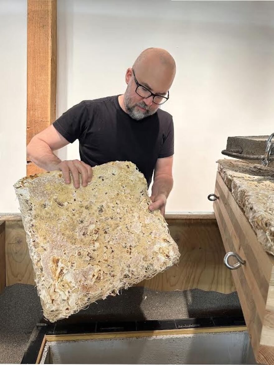 Man holding construction panel