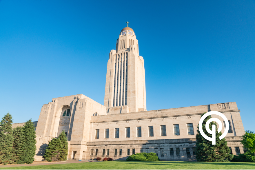 The Nebraska State Capitol tower against a clear sky